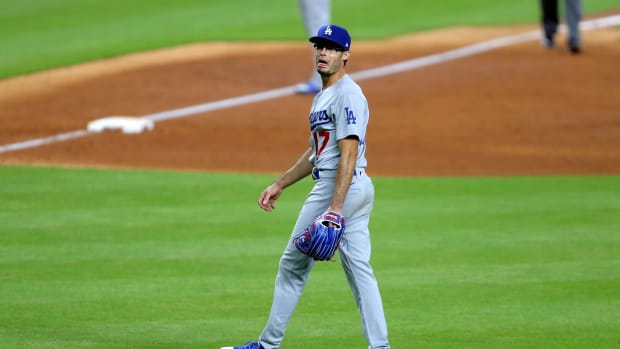 Jul 28, 2020; Houston, Texas, USA; Los Angeles Dodgers relief pitcher Joe Kelly (17) shouts at Houston Astros shortstop Carlos Correa (1, not shown) after a strikeout during the sixth inning at Minute Maid Park. Mandatory Credit: Erik Williams-USA TODAY Sports
